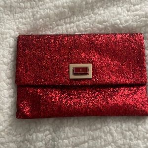 Anya Hindmarch clutch. Sparkle Red